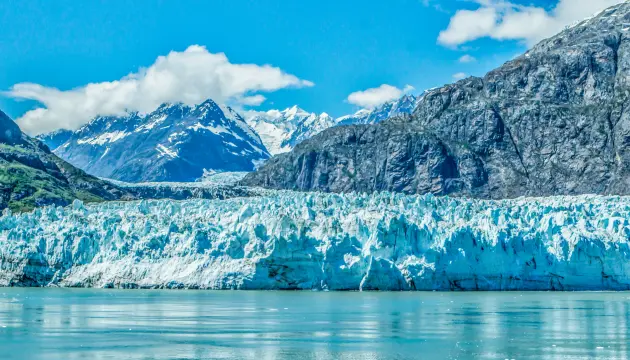 An Alaska glacier cruise takes you past towering ice walls